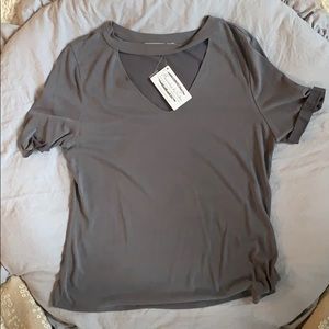 Short sleeved tee shirt with v neck and collar